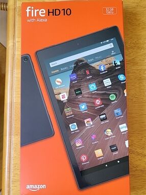 Amazon Fire HD10 Tablet in Black and Orange Packaging